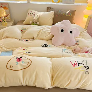 Cream yellow milk velvet duvet cover set with cute towel embroidery and plush star pillow.