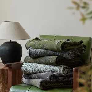 Vintage all-cotton jacquard throw blanket with fringe detail for cozy sofa and home decor.