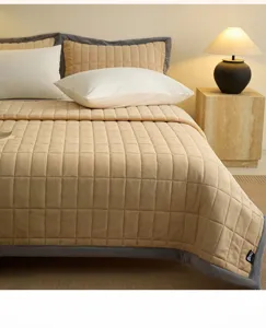 Close-up of thickened milk velvet quilted bed cover, showing soft texture and fine stitching.