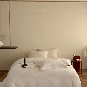 Wabi-sabi style cotton linen jacquard bedding set detail, premium textured bedroom decor.