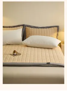 Thickened milk velvet quilted bed cover detail shot, warm anti-slip winter bedding setup.