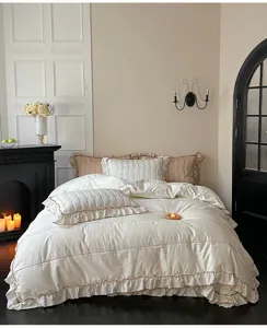 Juego de cama de lujo de algodón con volantes y bordado elegante para la decoracion del dormitorio.