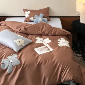 Detailed view of the 100S long-staple cotton plush towel embroidery bedding set.