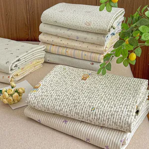 Quilted cotton-feel printed bed cover set with cute cartoon and floral patterns for all seasons.