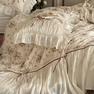 French vintage floral bedding set with ruffles and bows, elegant cotton blend duvet cover.