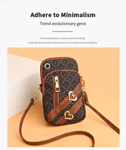 Women mini crossbody phone bag retro print PU leather shoulder bag with cute heart charms.