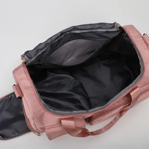 Geräumige rosa Sporttasche mit Nass-Trocken-Trennung für Fitness, Yoga und Reisen.