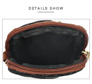 Detailed view of the mini crossbody phone bag interior, showcasing zipper and lining design.