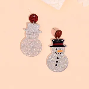 Festliche Weihnachts-Schneemann-Ohrhänger mit glitzerndem Silber und roten Akzenten.