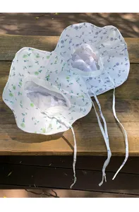 Summer floral bucket hat with large brim and chin strap, cute sun protection hat for women.