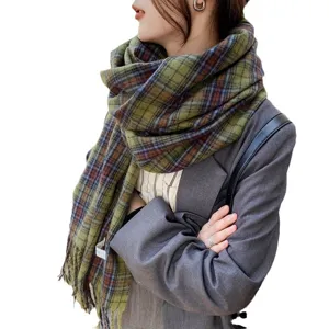 Green plaid winter scarf for women, classic tartan design, warm and stylish shawl wrap.