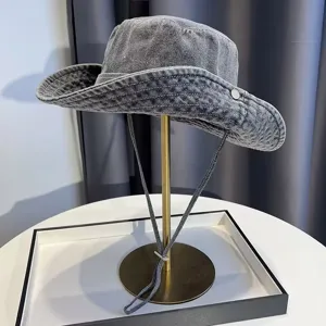 Retro washed denim bucket hat, versatile western cowboy style for outdoor sun protection hiking.