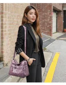 Washed leather women's shoulder bag with multi zippers and spacious compartments for daily use.