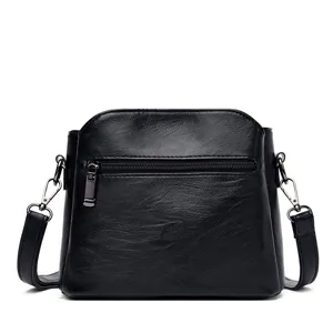 Schwarze Schultertasche aus PU-Leder für Damen, stilvolle Freizeittasche mit Fächern.