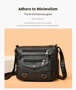 Stylish black leather crossbody bag with multi pockets and cute metal heart buckles for women.