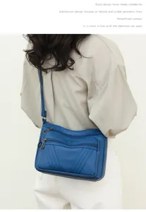 Stylish women soft leather shoulder bag with multi zippers, casual retro crossbody design.