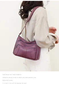 Women vintage soft leather shoulder bag with multiple zipper pockets and adjustable strap.