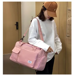 Gran bolsa de viaje rosa con múltiples bolsillos, bolso de hombro elegante para mujer.