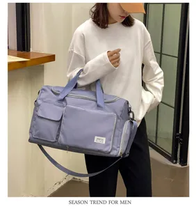 Bolso de viaje plegable de gran capacidad con bolsillos delanteros y correa ajustable