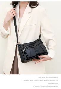 Women's black soft leather crossbody bag, large capacity multi-pocket vintage shoulder bag.