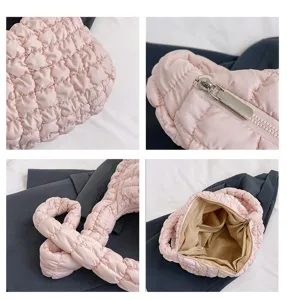 Pink quilted shoulder bag for women, soft puffer tote bag with zipper closure and spacious interior.