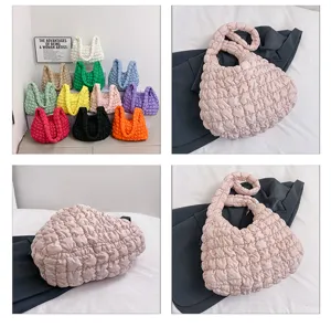 Detailed view of quilted cloud hobo shoulder tote bag showing multiple color options and angles.
