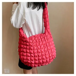 Casual bright pink puffer shoulder bag, soft quilted large capacity tote bag for daily wear.