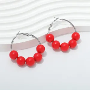 Fashion red beaded hoop earrings for women, stylish metal circle earrings with vibrant beads.