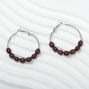Retro wooden bead hoop earrings for women, minimalist style metal circle fashion jewelry.