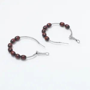 Retro wooden bead hoop earrings for women, minimalist style handmade metal and wood drop earrings detail.