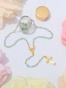 Stupendo collana rosario perle blu con ciondolo croce dorata e piccolo barattolo di vetro.