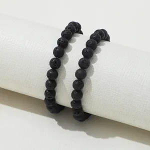 Natural black lava stone beaded bracelet for men and women, minimalist healing stone jewelry.