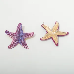 Stunning gradient rhinestone starfish earrings with gold-tone back design. Fashion jewelry.
