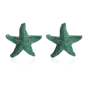 Chic green crystal starfish earrings for women, stylish metal rhinestone fashion jewelry.