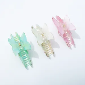 Resin rhinestone hair claw clip detail, sparkling crystals, secure spring for chic daily styles.