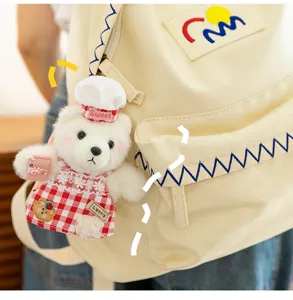 Cute chef bear plush pendant accessory for canvas backpack, adorable toy keychain decor.