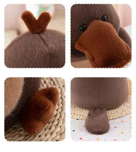 Close-up details of the brown plush platypus toy showing soft texture and cute plush features.