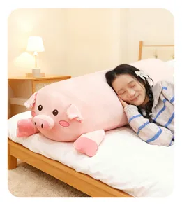 Cute long pink pig plush toy body pillow for bed, soft sleeping companion and cozy room decor.