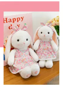 Schattig langoor pluche konijn met een charmante bloemenjurk en een bijpassende haarband.