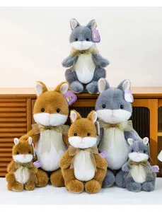 Cute plush rabbit doll with bow tie, soft stuffed animal toy standing for birthday gift.