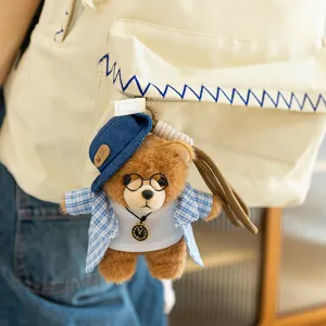Cute plush bear keychain with glasses and hat, fashionable backpack pendant decoration gift.