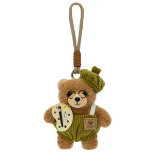 Cute artist bear plush keychain, brown stuffed animal bag charm with cute beret and overalls.