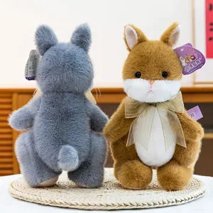 Cute cartoon bunny plush toy with bow tie, soft stuffed rabbit doll for birthday gift.