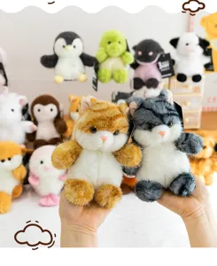 Soft fluffy plush cat toy, cute stuffed animal doll for desktop decoration and kids gift.