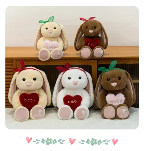 Cute plush long-ear rabbit toy with heart pillow, soft stuffed doll for kids gift details view.