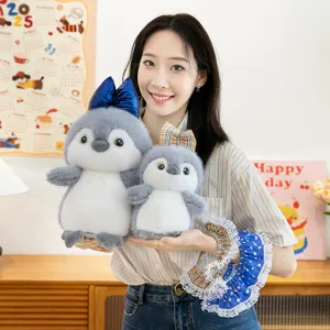 Lindo pingüino de peluche con lazo a cuadros y falda suave kawaii regalo para las niñas.