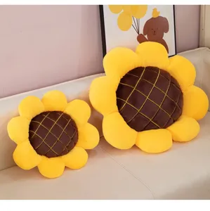 Cute sunflower plush cushion detail showing soft yellow petals and brown checkered center.