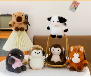 Detailed view of cute cartoon plush animal dolls, soft stuffed toys arranged on tabletop.
