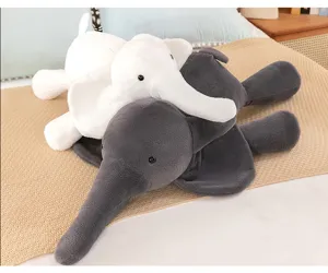 Cute elephant plush toy doll detail shot, soft stuffed animal pillow for bed decoration.