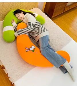 Comfortable long body pillow for pregnancy and sleeping, soft hugging support cushion for women.